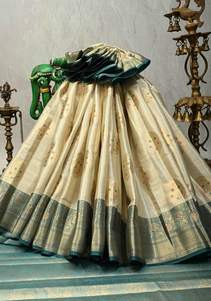 Beige Kanjivaram Tissue Semi Silk Saree with Meenakari Paisley Zari Buttas and Contrast Zari Border