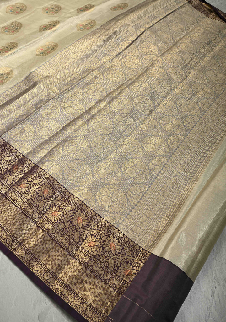 Cream Kanjivaram Tissue Semi Silk Saree with Meenakari Paisley Zari Buttas and Contrast Zari Border