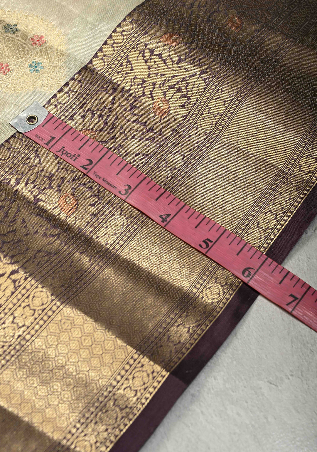 Cream Kanjivaram Tissue Semi Silk Saree with Meenakari Paisley Zari Buttas and Contrast Zari Border