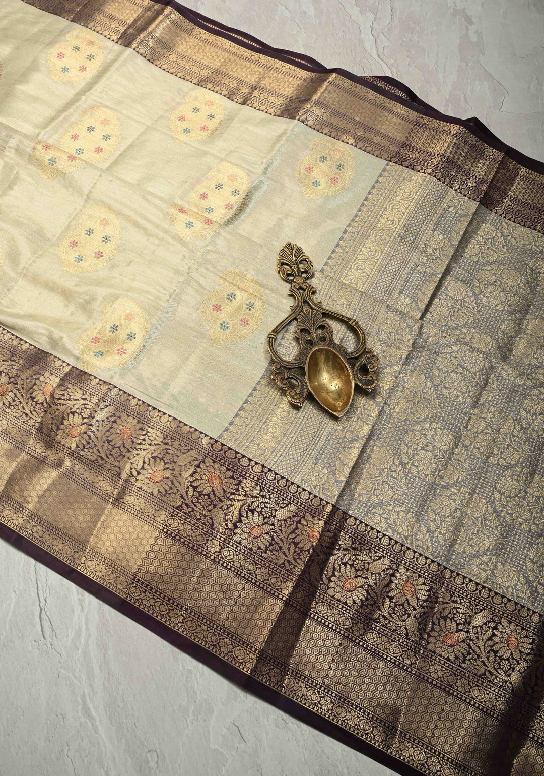 Cream Kanjivaram Tissue Semi Silk Saree with Meenakari Paisley Zari Buttas and Contrast Zari Border