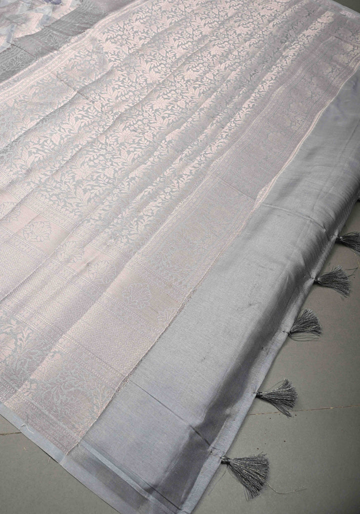 Clody Gray Floral Digital Print on Banarasi Semi Silk Saree with Muted Zari Chevron Design and Wide Zari Border | SHOBITAM