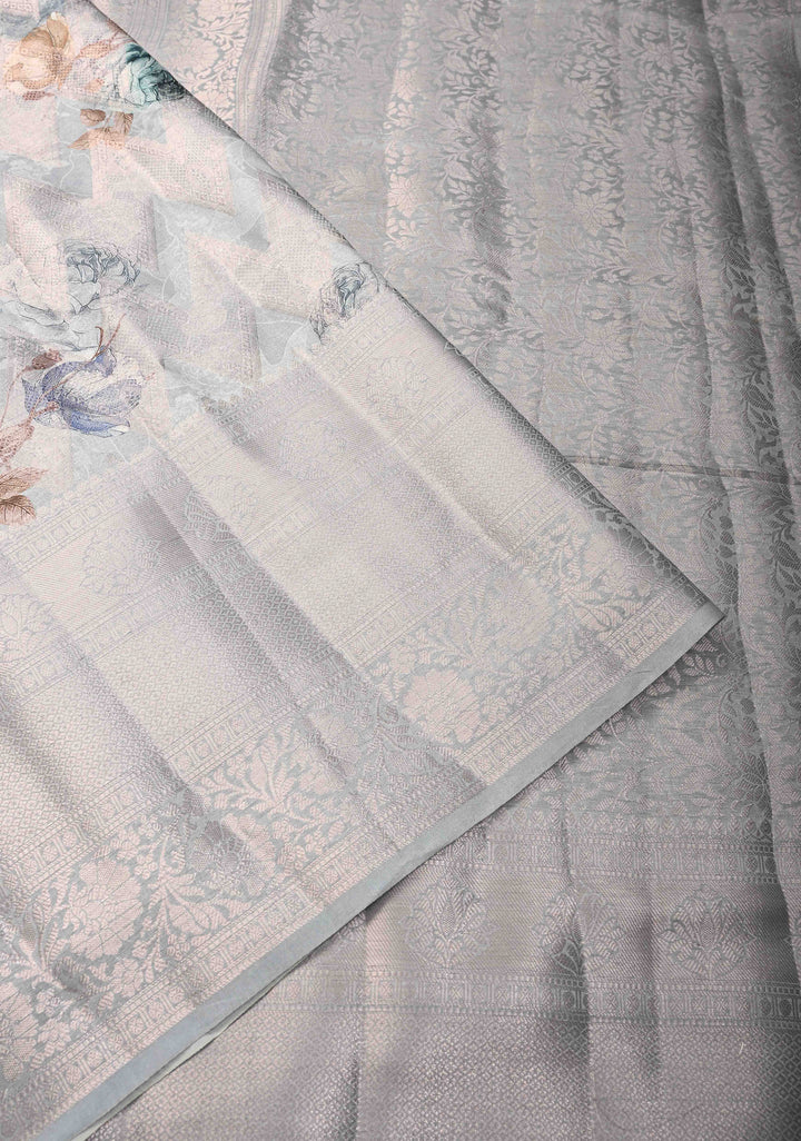 Clody Gray Floral Digital Print on Banarasi Semi Silk Saree with Muted Zari Chevron Design and Wide Zari Border | SHOBITAM