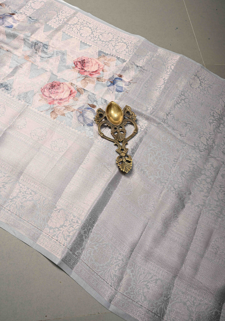 Clody Gray Floral Digital Print on Banarasi Semi Silk Saree with Muted Zari Chevron Design and Wide Zari Border | SHOBITAM