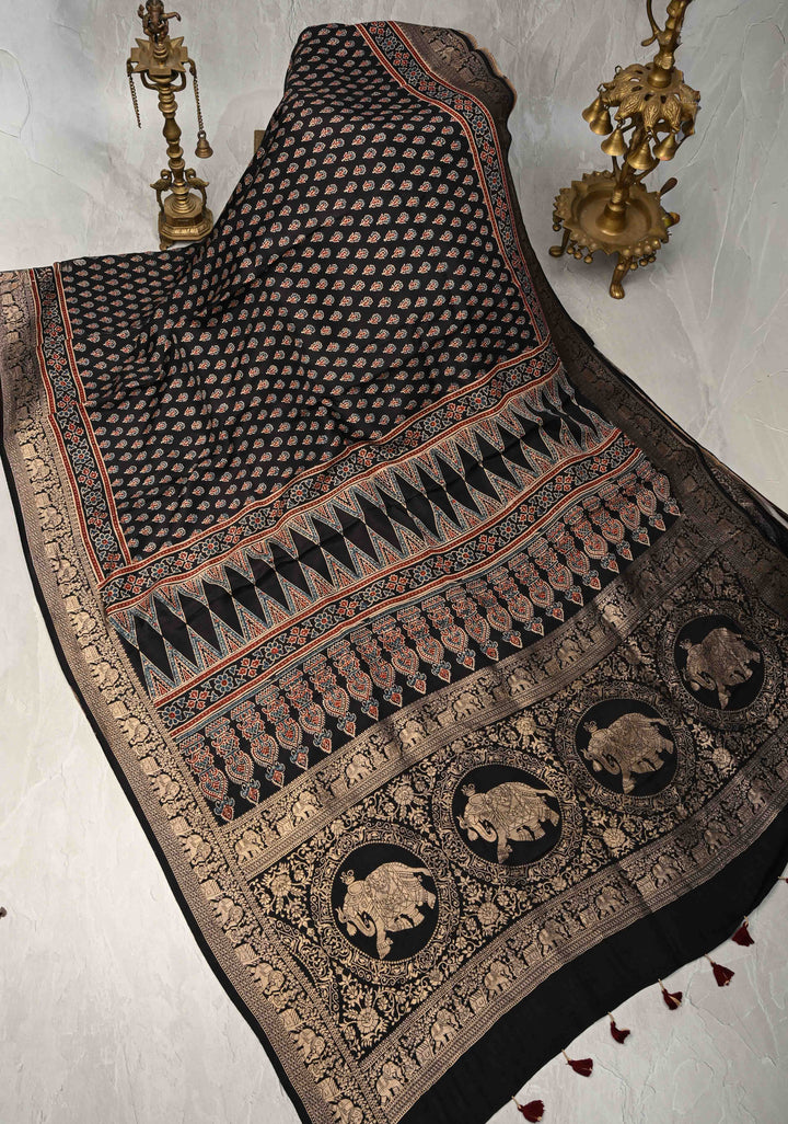 Black Ajrakh Hand Block Print on Dola Silk Saree with Fancy Zari Border