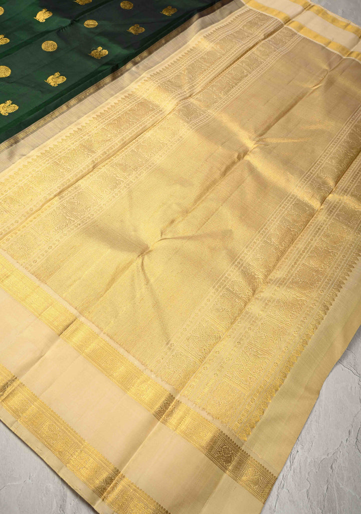 Bottle Green Kanjivaram Pure Silk Saree with Zari Buttas and Korvai Contrast Rettaipet Zari Border | SILK MARK CERTIFIED