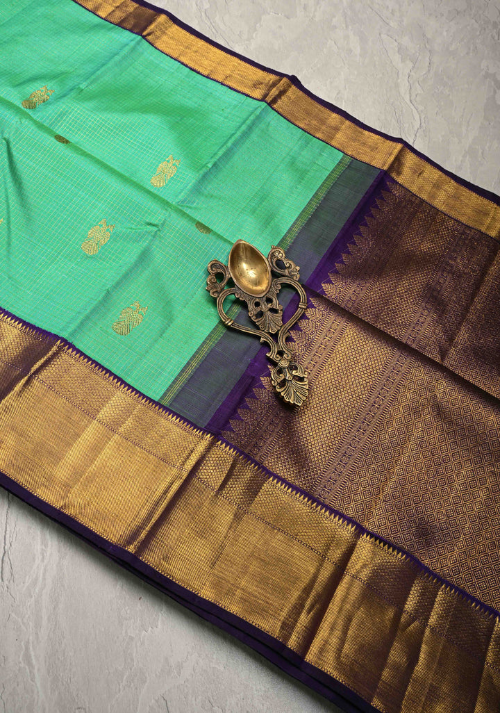 Puer Zari Heritage Podi Kattam Zari checks and Gandaberunda Buttas on Green Dual tone Pure Silk Kanjivaram Saree with Zari | SILK MARK CERTIFIED