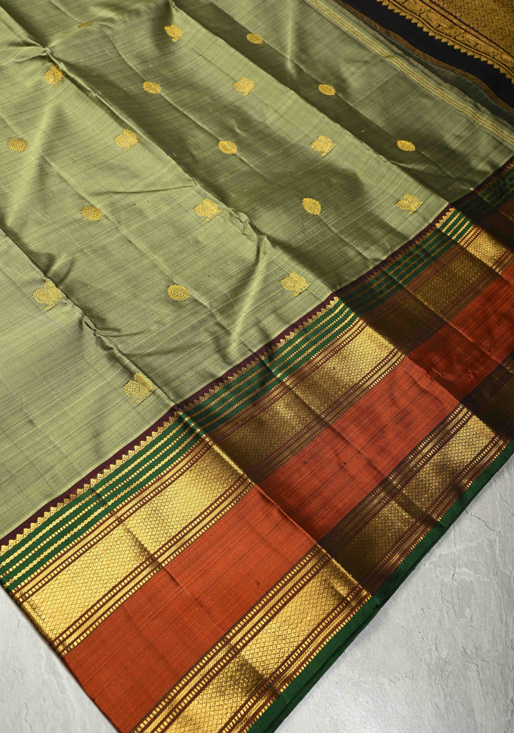 Sage Green Pure Kanjivaram Silk saree with Zari Buttas and Contrast Zari Border| SILK MARK CERTIFIED