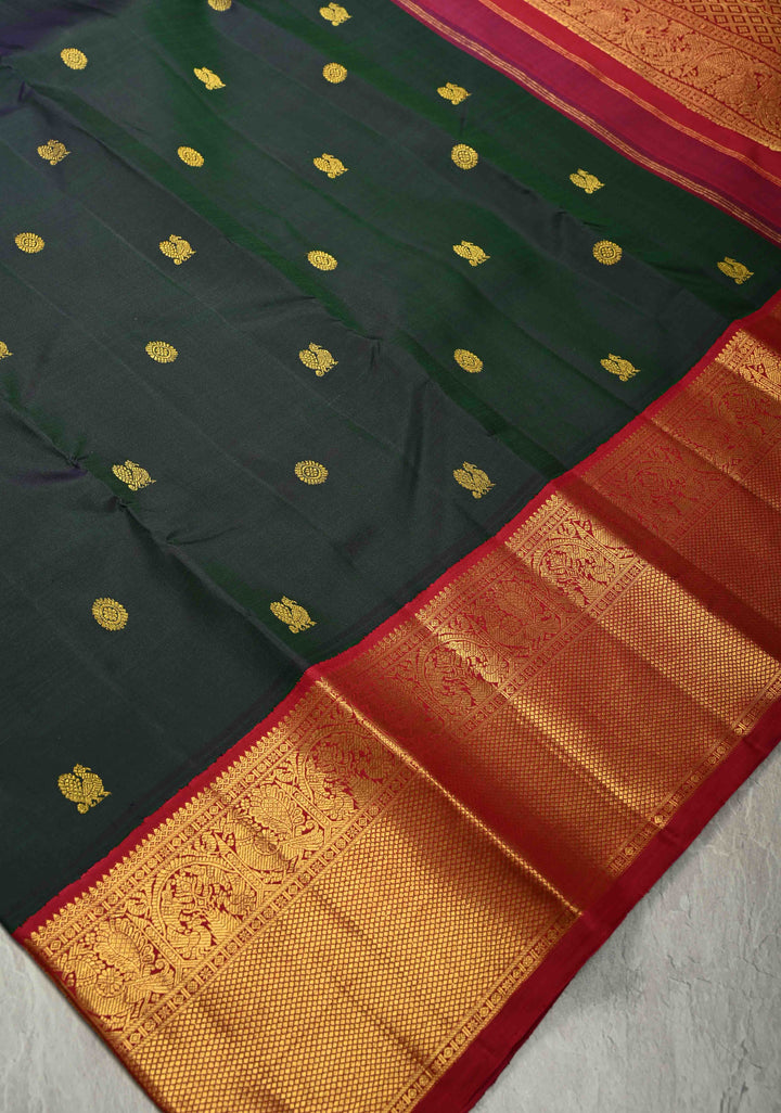 Bottle Green Dual Tone Pure Kanjivaram Silk Saree with Zari Buttas and Contrast Zari Border | SILK MARK CERTIFIED
