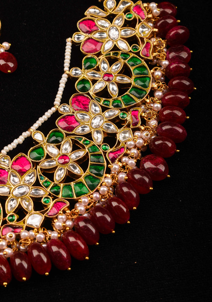Celestial Ahmedabadi Jadau Necklace and Earrings Set with maroon dangling stones.