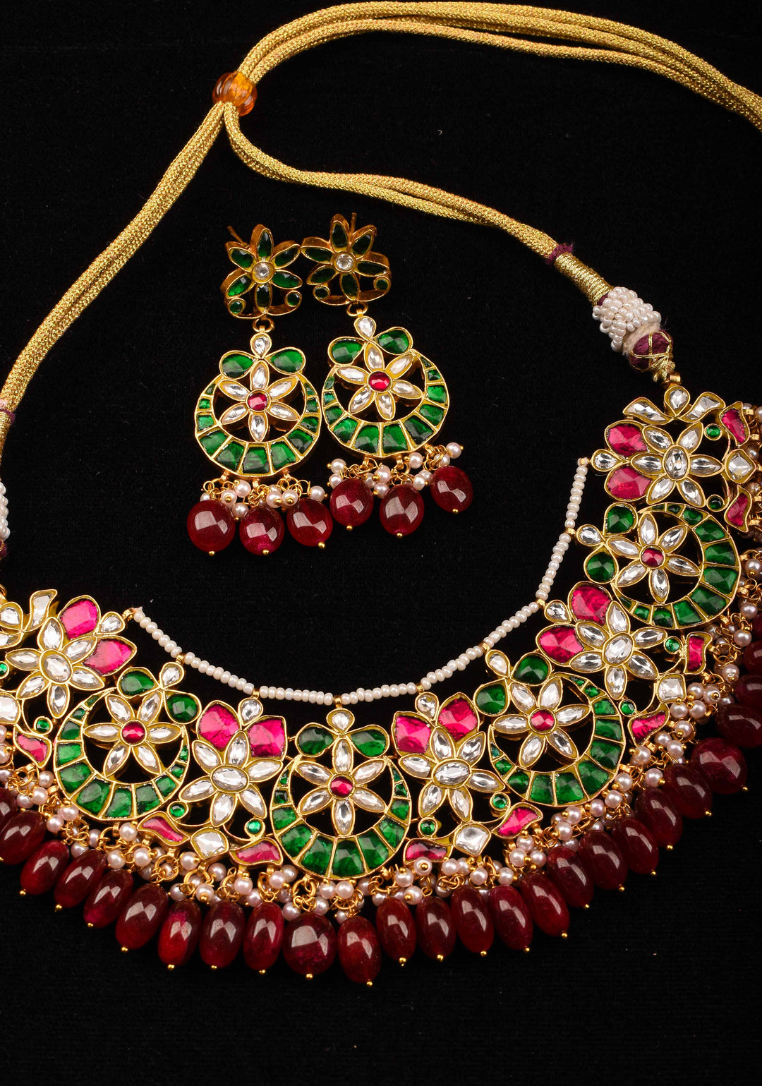 Celestial Ahmedabadi Jadau Necklace and Earrings Set with maroon dangling stones.