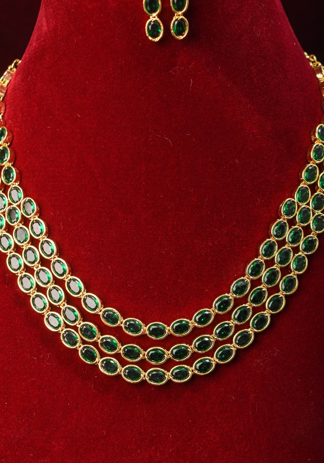 Green Stone Necklace with 3 strands of oval stones and matching earrings