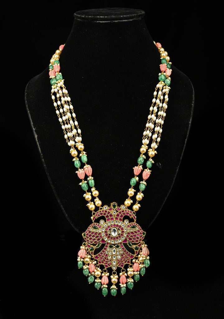 Statement pendant in peacock motif necklace with polki stones pearls and Dangling Beads | Shobitam Jewelry