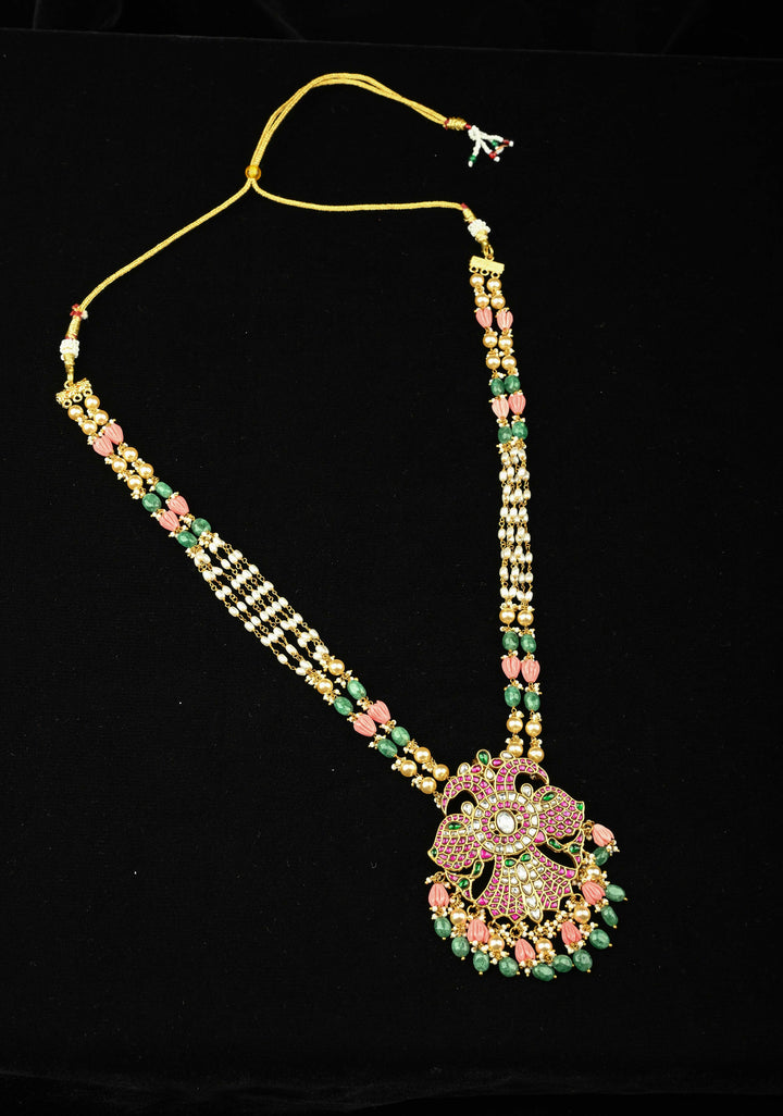 Statement pendant in peacock motif necklace with polki stones pearls and Dangling Beads | Shobitam Jewelry