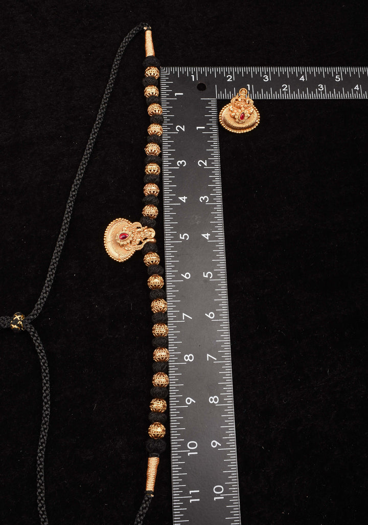 Traditional Black Thread Necklace Set with Lakshmi Pendant and Gold Beads