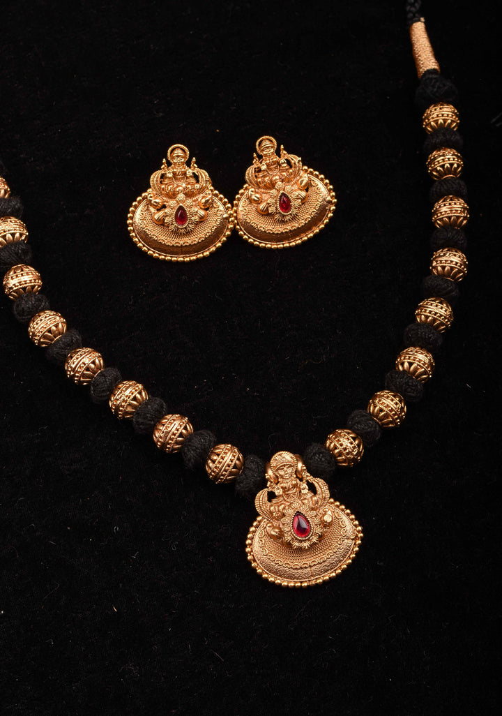 Traditional Black Thread Necklace Set with Lakshmi Pendant and Gold Beads
