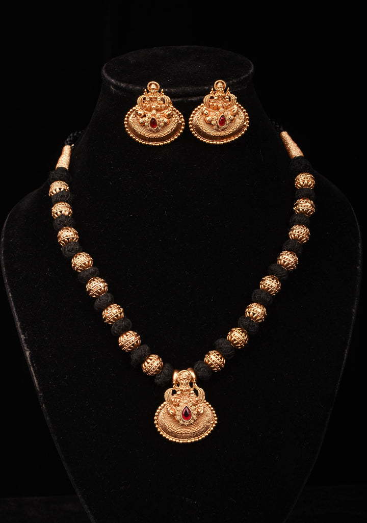 Traditional Black Thread Necklace Set with Lakshmi Pendant and Gold Beads