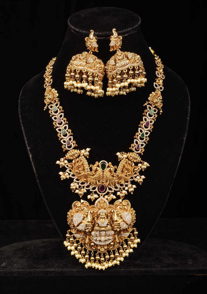 Stunning Antique Gold Finish Temple Necklace Set with Goddess Lakshmi Pendant and Pearl Embellishments