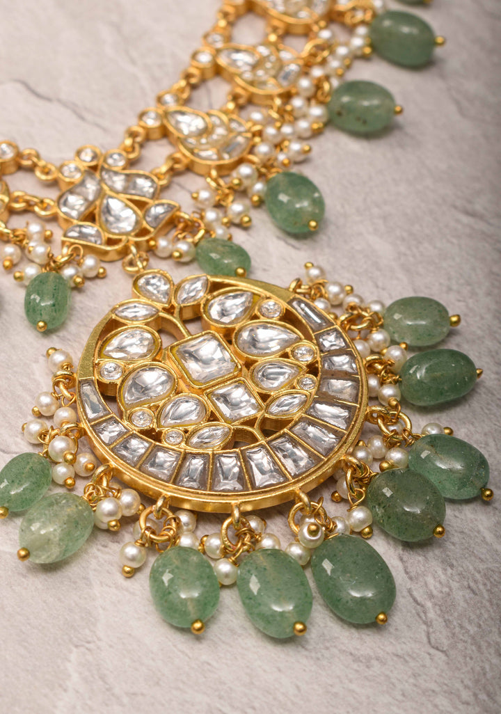 Statement Kundan Necklace Set with Circular Pendant and Green Bead Accents