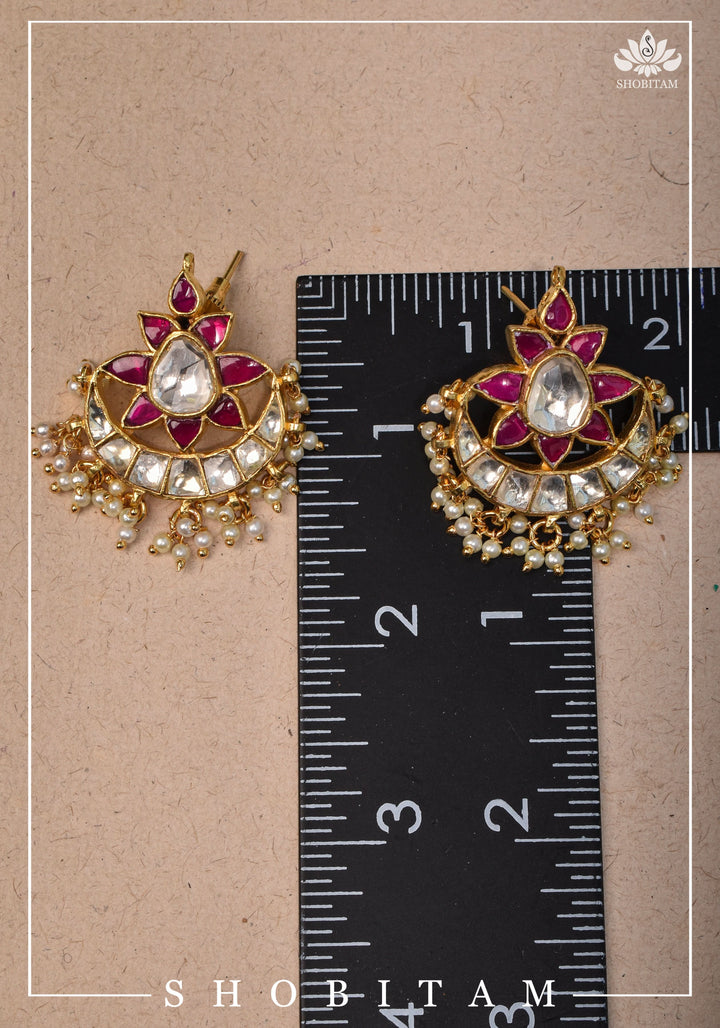 Floral Crescent shaped Kundan earrings with dangling Pearls