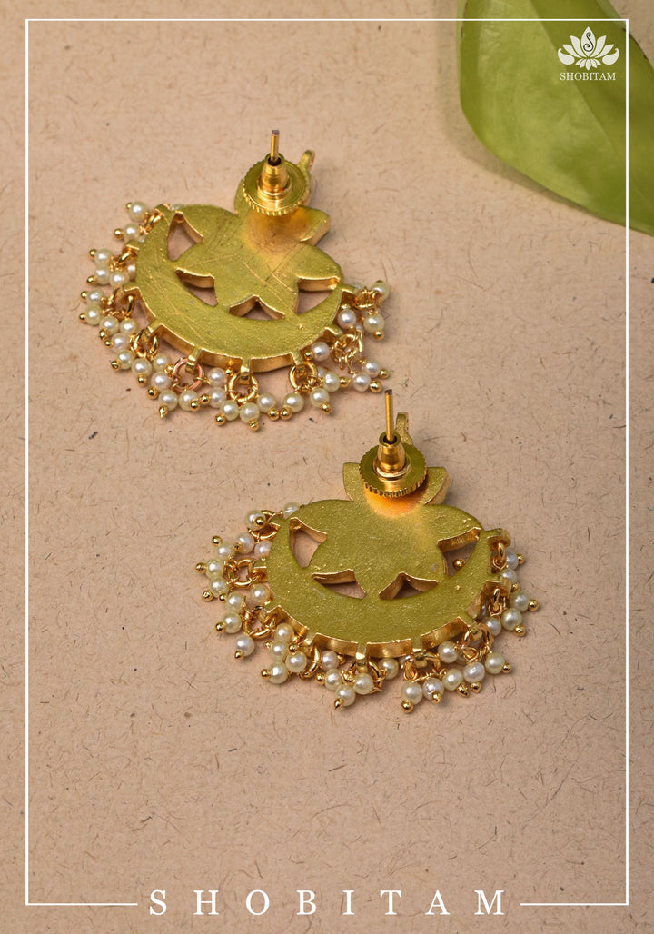 Floral Crescent shaped Kundan earrings with dangling Pearls