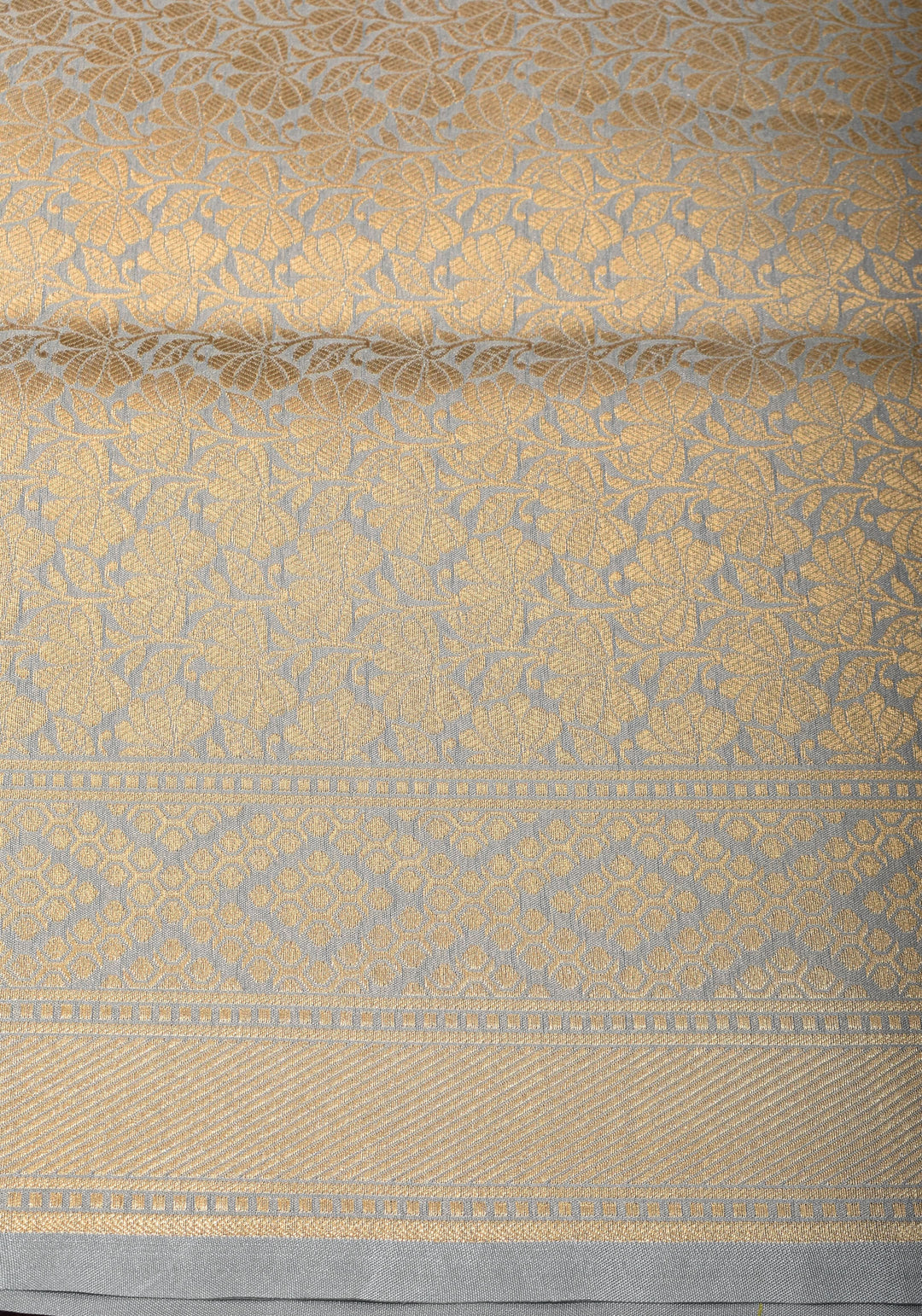 Gray tone Exquisite Meenakari Rose Jaal Semi Silk Saree and zari border