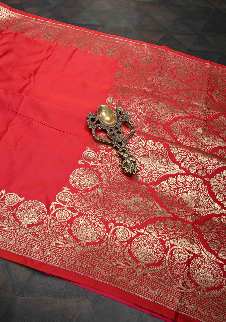 Pinkish Red Banarasi Semi Silk Saree With Floral Zari Border