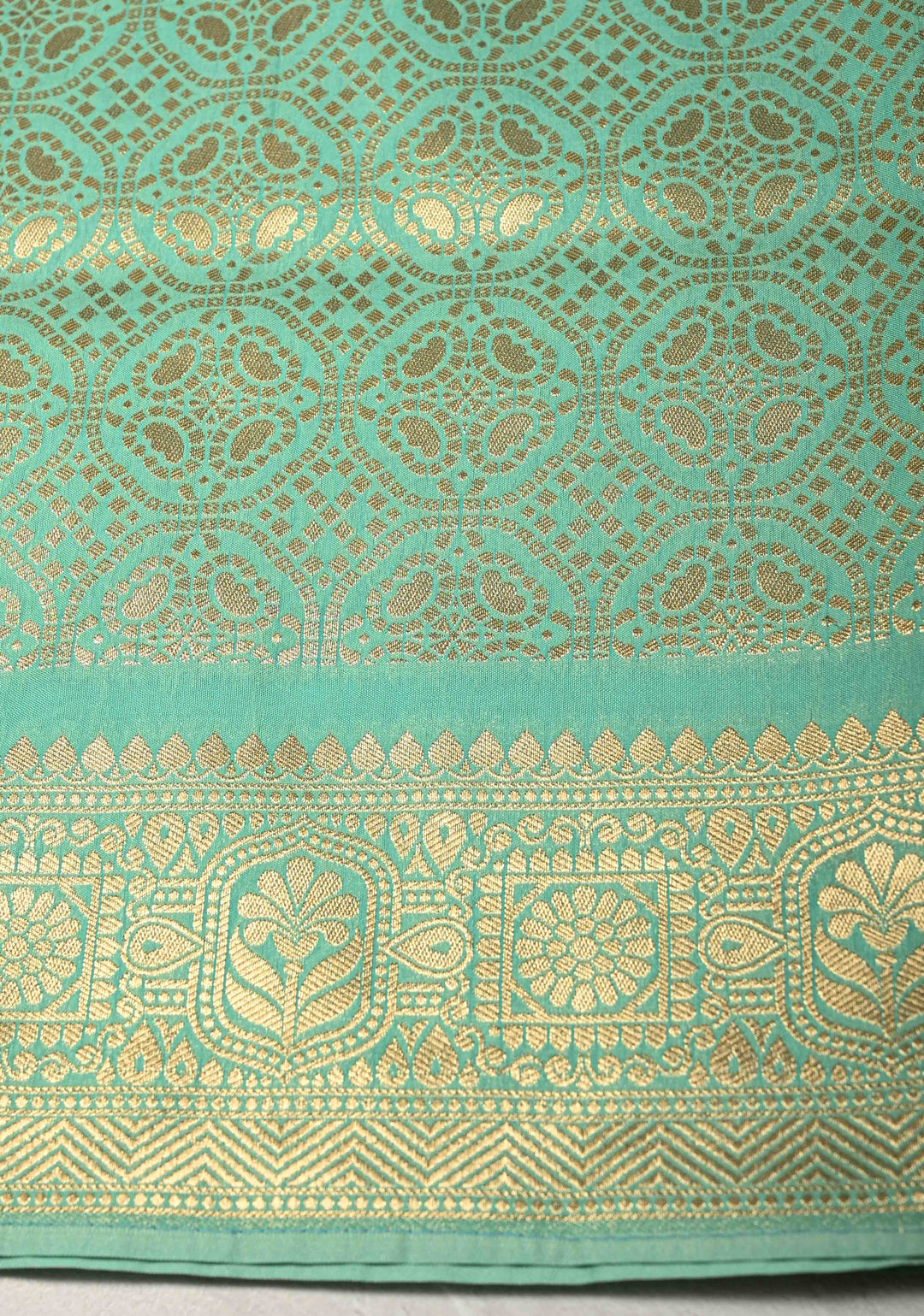Spring Green Trellis Jaal on Semi Silk Saree with Meenakari Buttas and Zari Border