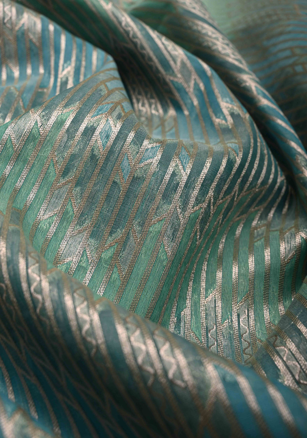 Pastel Hued Rangkaat Style on Banarasi Semi Kora Saree with Chevron Pattern and Zari Border