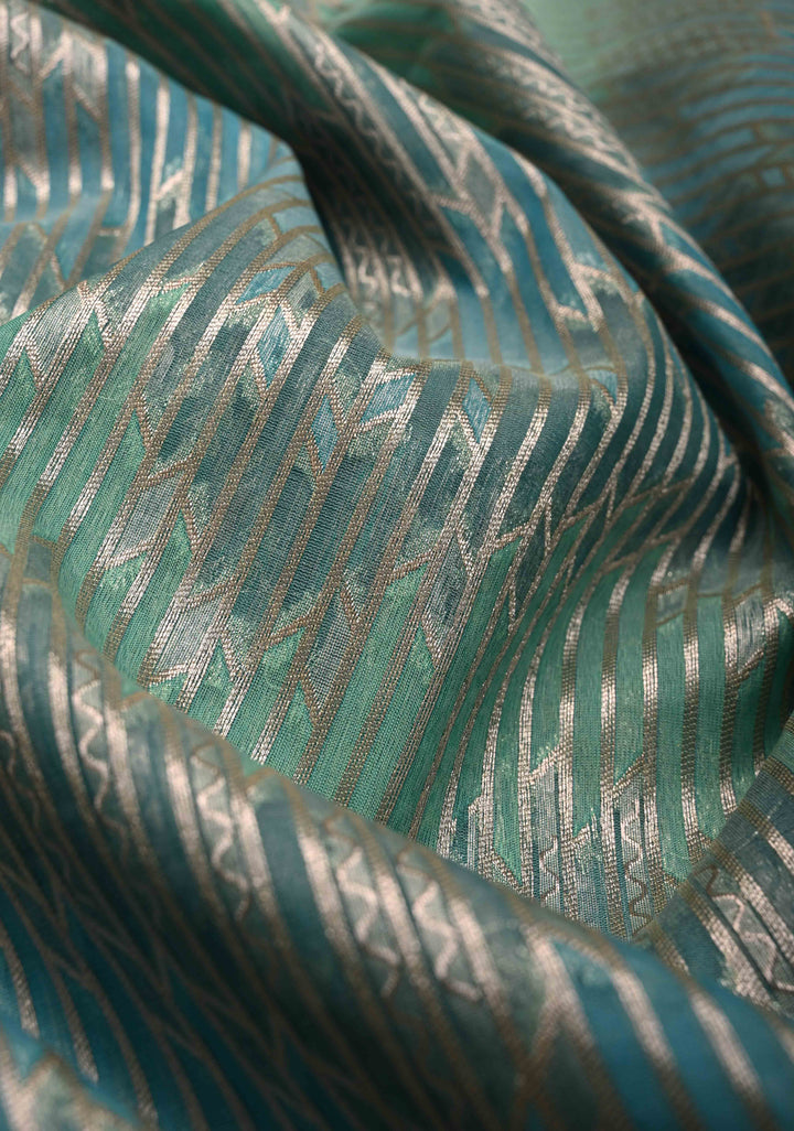 Pastel Hued Rangkaat Style on Banarasi Semi Kora Saree with Chevron Pattern and Zari Border