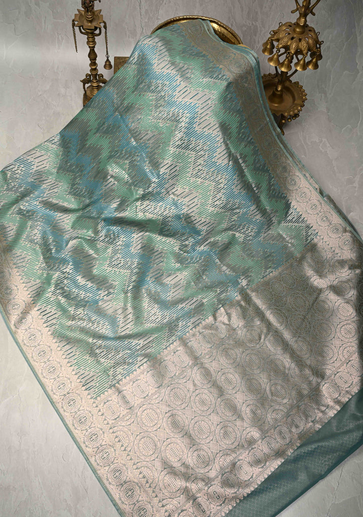 Pastel Hued Rangkaat Style on Banarasi Semi Kora Saree with Chevron Pattern and Zari Border