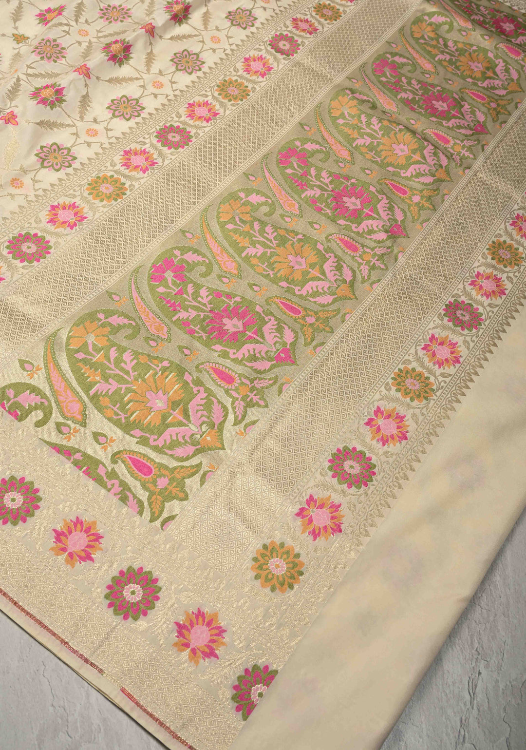 Ivory Moroccan Jaal on Semi Silk Saree with Floral Meenakari Buttas and Zari Border