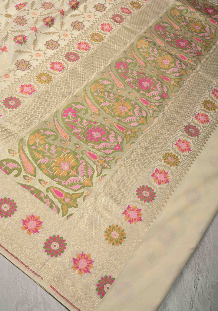 Ivory Moroccan Jaal on Semi Silk Saree with Floral Meenakari Buttas and Zari Border
