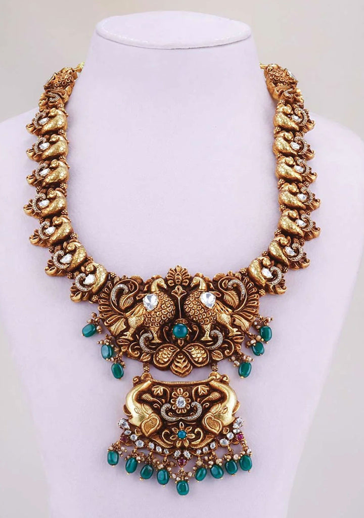 92.5 Silver 24 Kt Gold Plated Standout Necklace with Twin Peacock and Elephant pendant and Moissanite stones