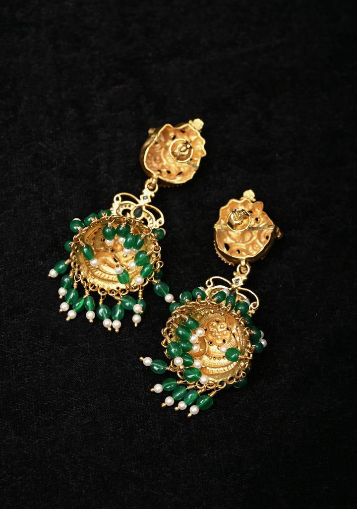 Preorder : 92.5 Silver, 22 kt Gold-Plated Jhumka Earrings with Peacock and Floral Motifs