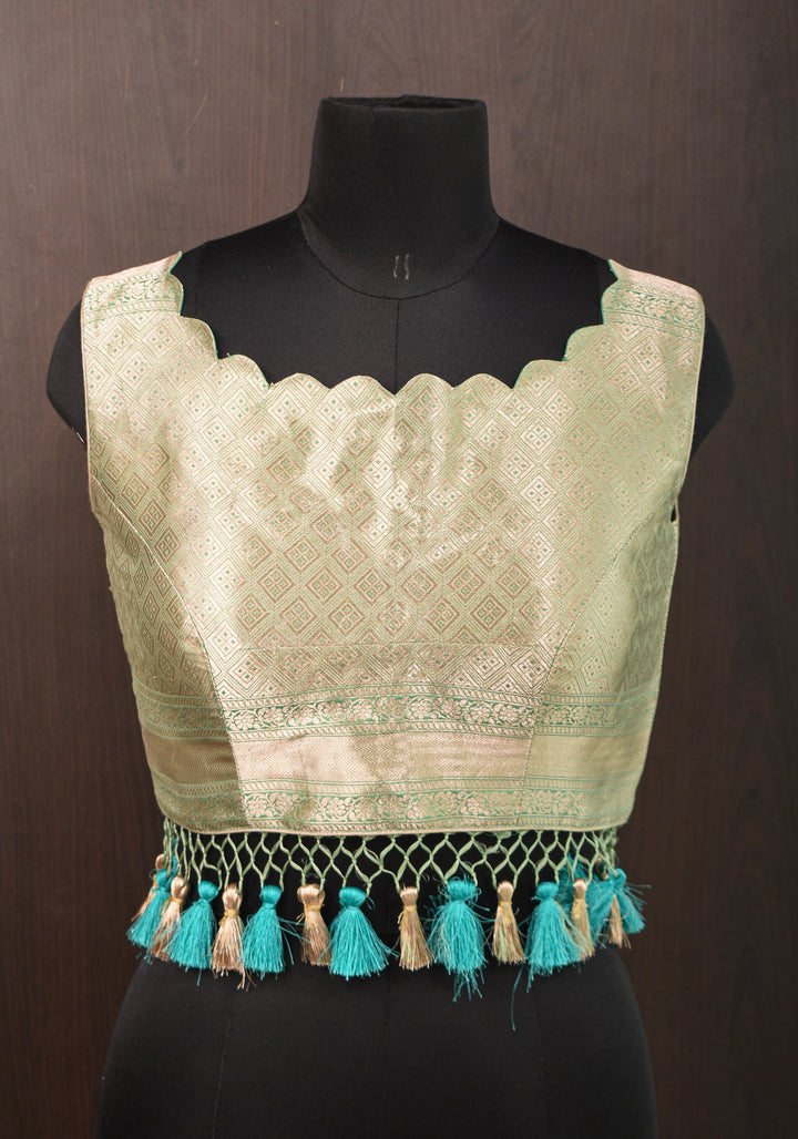 Size:36 Pure Silk Brocade Scallop neck Blouse with tassels in Aqua and water zari