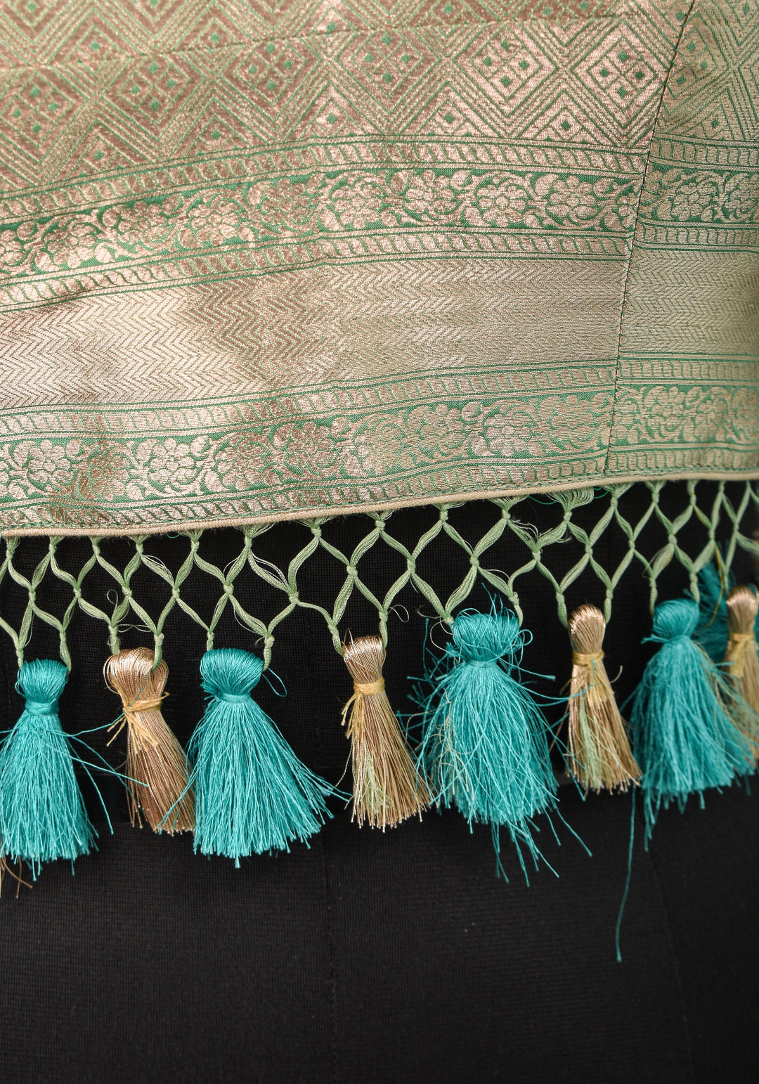 Size:36 Pure Silk Brocade Scallop neck Blouse with tassels in Aqua and water zari