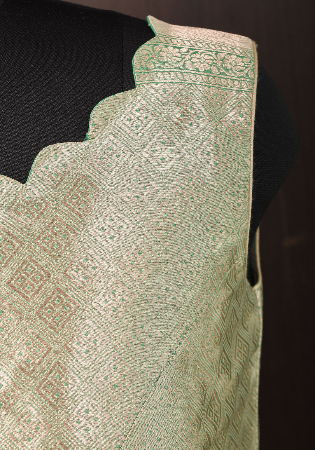 Size:36 Pure Silk Brocade Scallop neck Blouse with tassels in Aqua and water zari