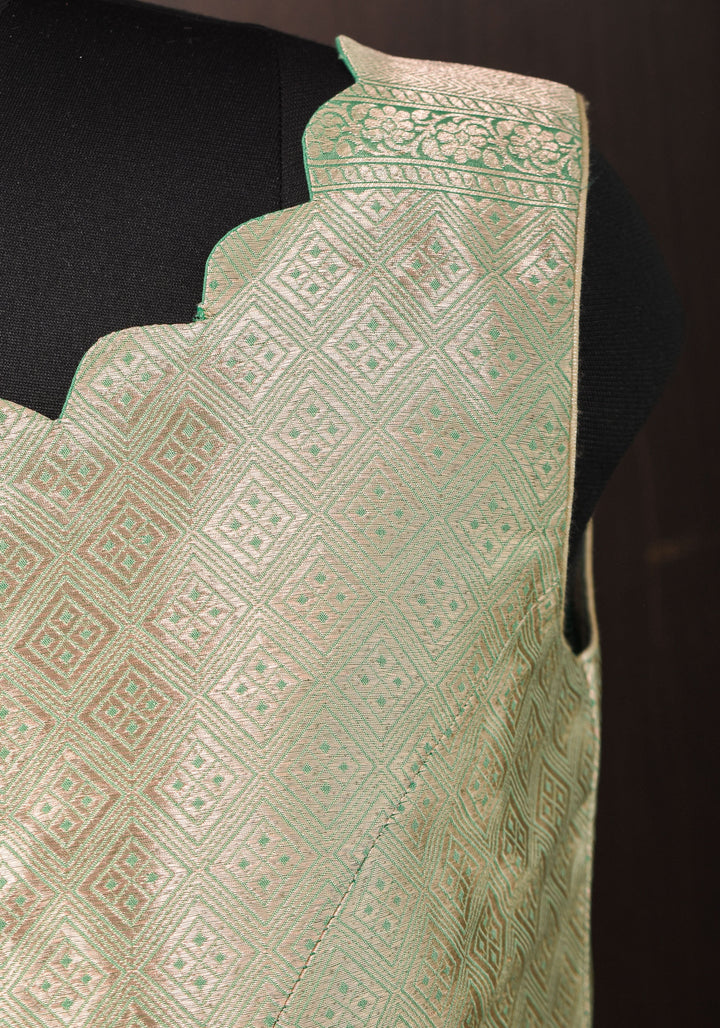 Size:36 Pure Silk Brocade Scallop neck Blouse with tassels in Aqua and water zari