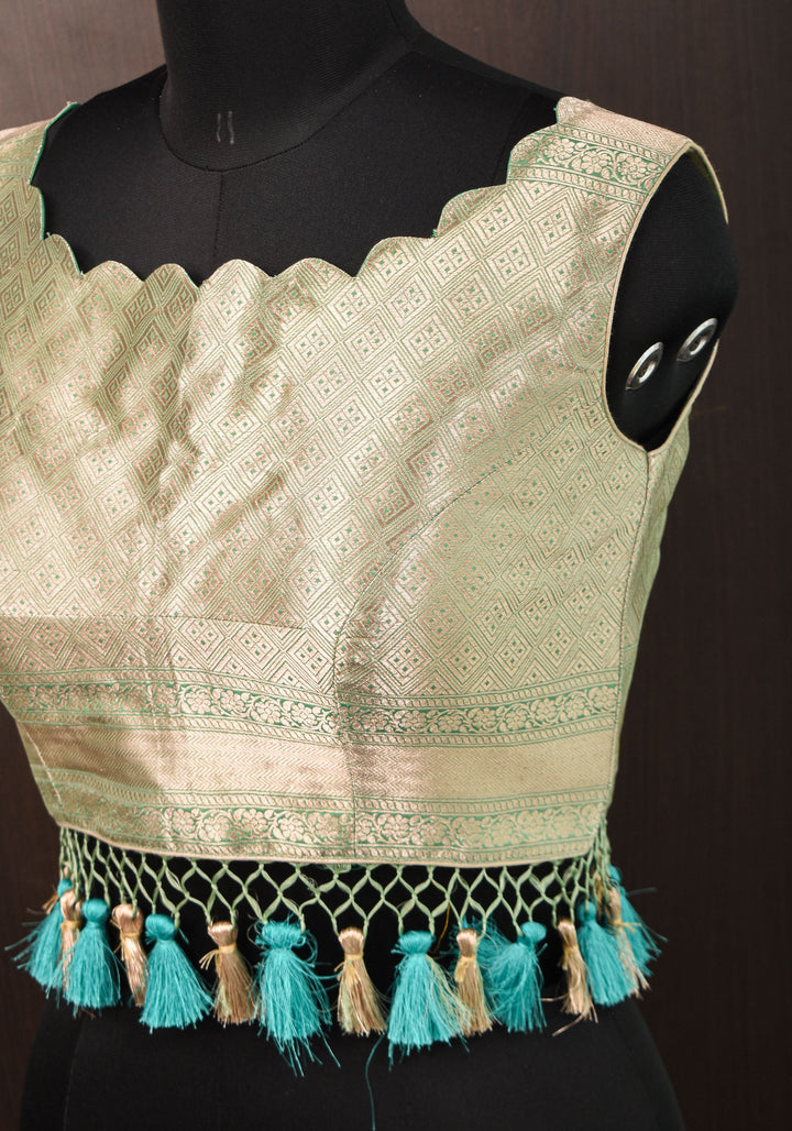 Size:36 Pure Silk Brocade Scallop neck Blouse with tassels in Aqua and water zari