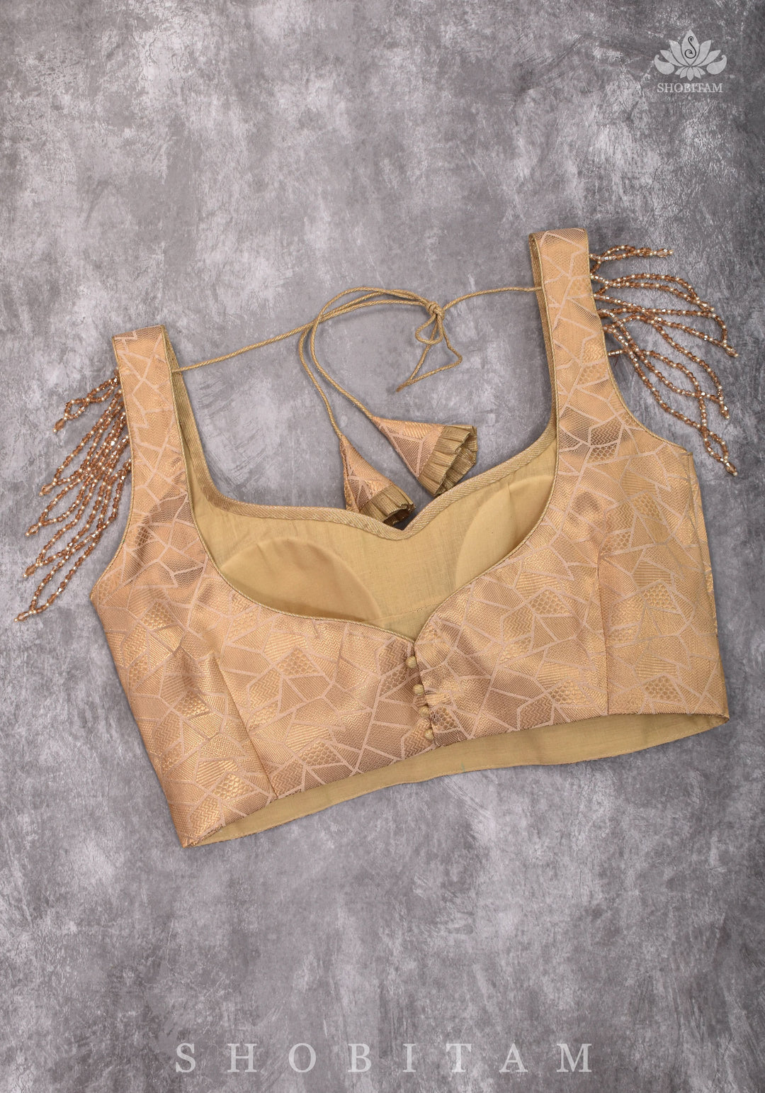 Golden Self Weave Geometric Design Blouse with Dangling multirow crystals over upper arm