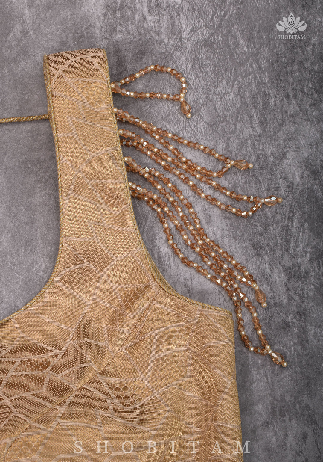 Golden Self Weave Geometric Design Blouse with Dangling multirow crystals over upper arm