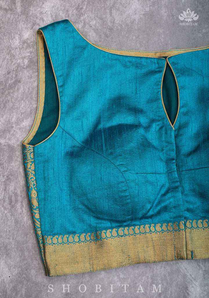 Pure Raw Silk Sleeveless blouse in Blue Green with Wide Kanchi Border detailing in back