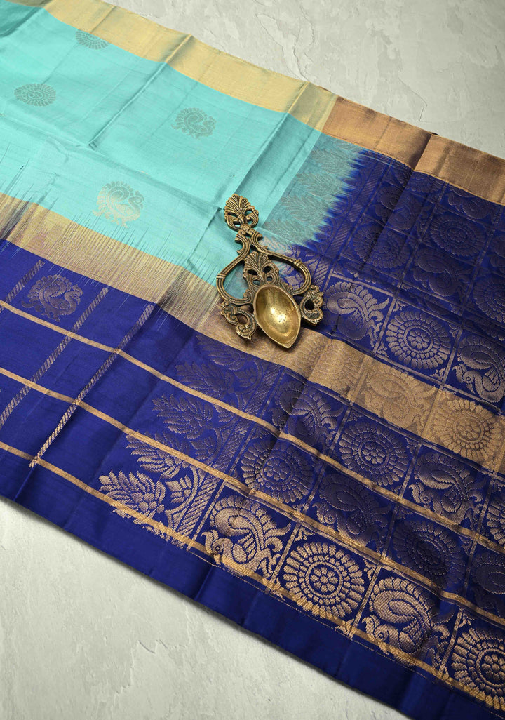 Powder Blue Kanjivaram Soft Silk Saree with Peacock Buttas and Contrast Zari Checks Border | SILK MARK CERTIFIED