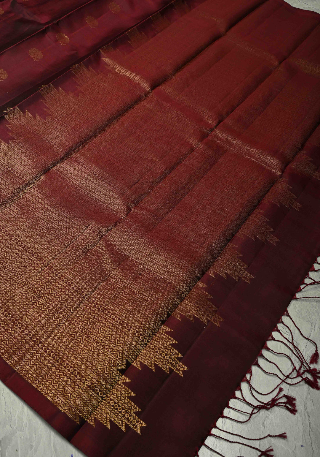 Deep maroon  Kanjivaram Soft Silk Saree with Floral Zari Buttas and Temple Zari Border | SILK MARK CERTIFIED