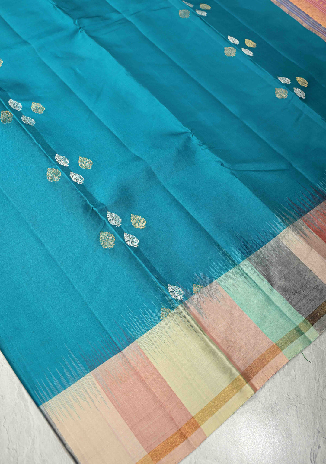 Turquoise Blue Pure Kanjivaram Soft Silk Saree with Gold-Silver Floral Buttas and Rangkaat Style Border | SILK MARK CERTIFIED