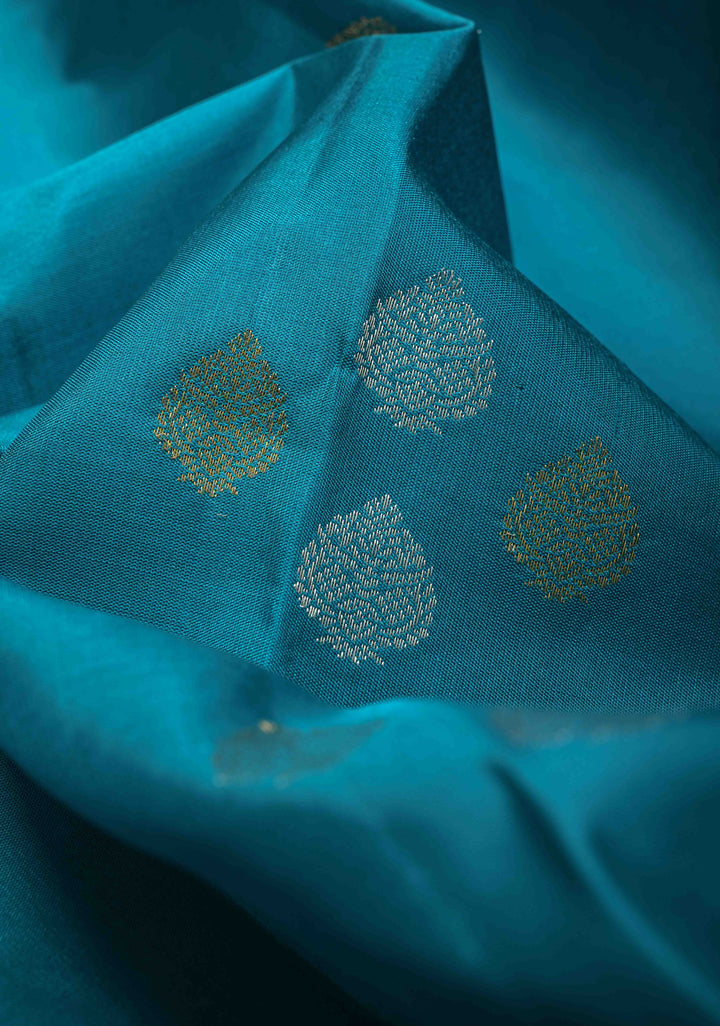 Turquoise Blue Pure Kanjivaram Soft Silk Saree with Gold-Silver Floral Buttas and Rangkaat Style Border | SILK MARK CERTIFIED