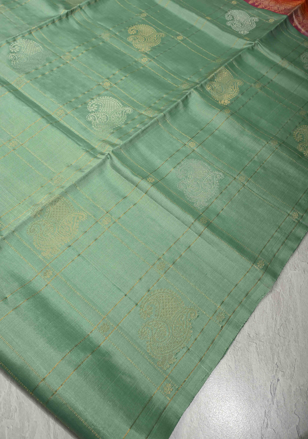 Sage Green Borderless Zari Checks on Pure Kanjivaram Soft Silk Saree with Gold-Zilver Zari Buttas and Contrast Peach-Orange Pallu   | SILK MARK CERTIFIED