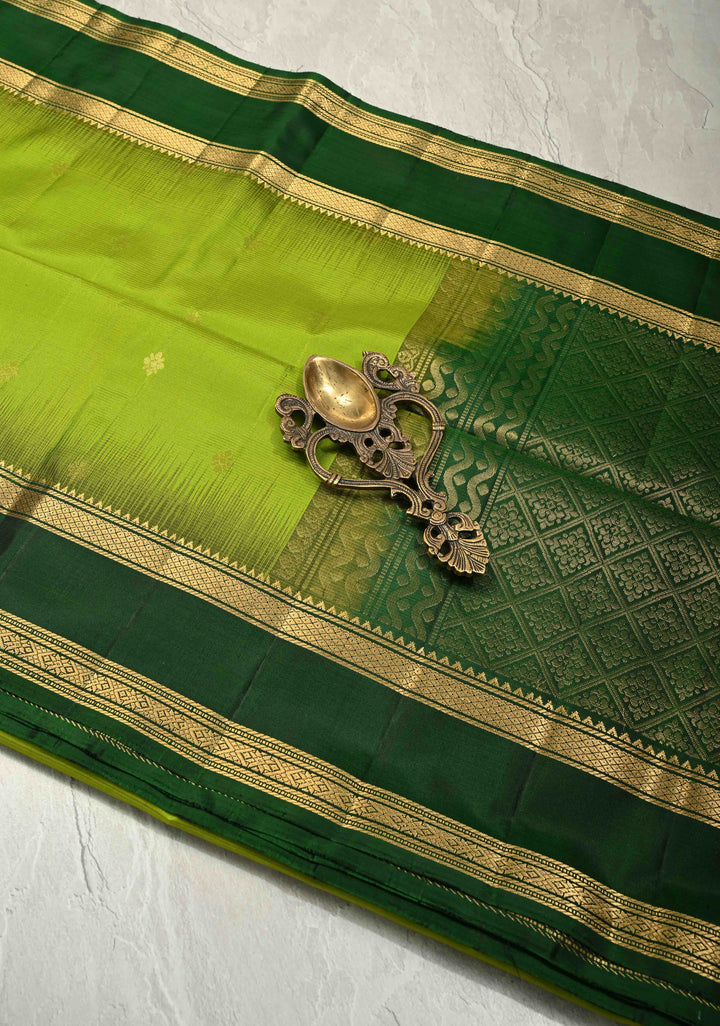 Lime Green Pure Kanjivaram Soft Silk Saree with Zari Buttas and Contrast Bottle Green Rettiapet Zari Border | SILK MARK CERTIFIED
