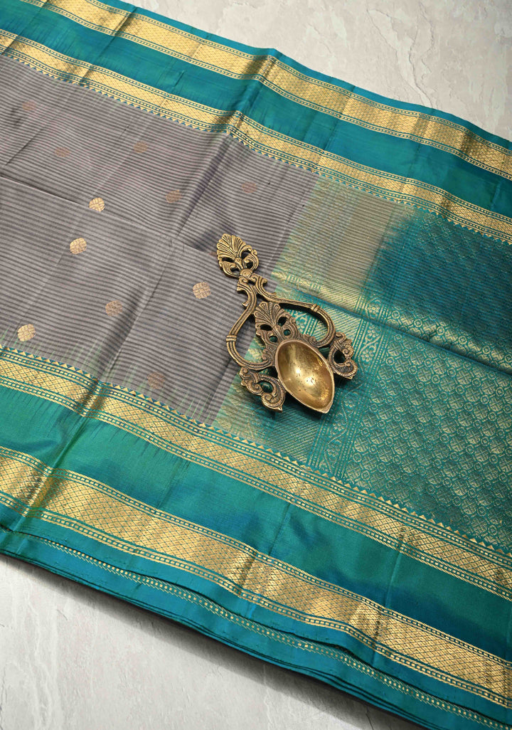 Cement Gray Pure Kanjivaram Soft Silk Saree with Zari Buttas and Contrast Turquoise Blue Rettiapet Zari Border | SILK MARK CERTIFIED