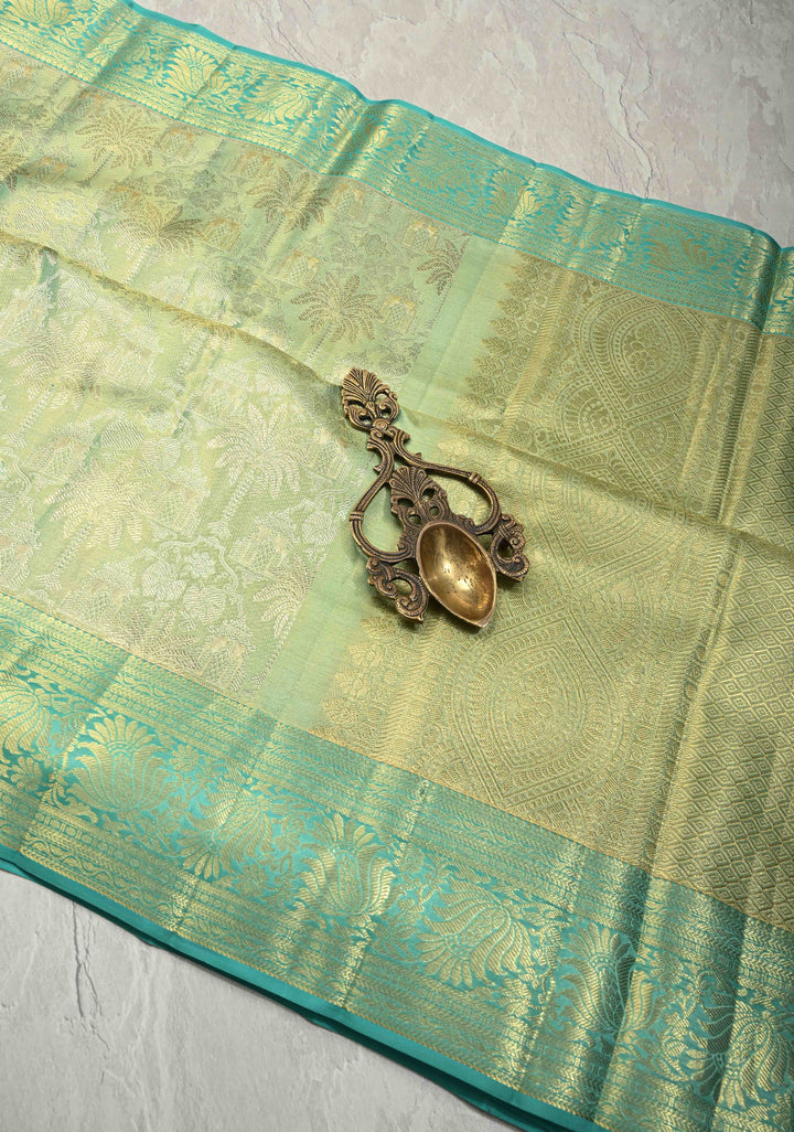 Pista Green Dual Tone Tissue Kanjivaram Pure Silk Saree with Meenakari  Brocade and Zari Border | SILK MARK CERTIFIED